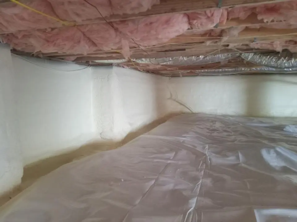 Crawl space encapsulation with closed-cell spray foam for Commercial Roof Restoration in South Huntingdon